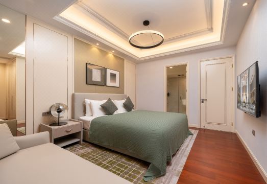 호텔 & 레지던스 유캔 쑤저우 베이의 넓고 깨끗한 객실