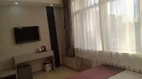 Zhangwu Sunshine Hotel - parking
