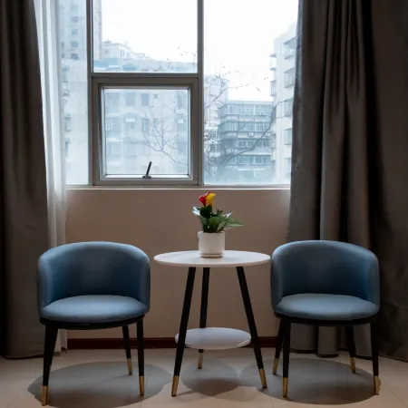 Kana Business Hotel (Zhanjiang Haitian Park Yingzhan Holiday Plaza)