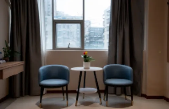 Kana Business Hotel (Zhanjiang Haitian Park Yingzhan Holiday Plaza)