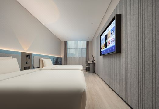 아투어 라이트 호텔 상하이 민항 마차오의 객실 침대 이미지