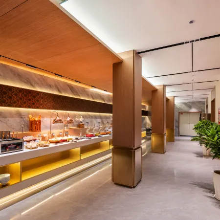Baocheng Zhixuan Hotel (Luoshan Dingsheng Plaza Branch)