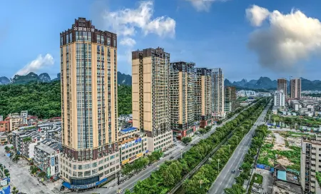 Jinyuan City Apartment Hotel (Hechi Vocational Education Center Branch) Отели в г. Хэчи