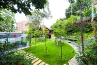 JinJiYan Sandawood B&B Hotels near Huangjinbu Colorful Mucuna Birdwoodiana Flower Base