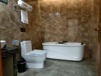 Xingyi Qiaofu Hotel - خدمة نقل من وإلى المطار