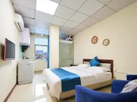 木槿輕奢公寓HOSTEL（深圳大芬地鐵站油畫村店） 丹竹头附近的飯店