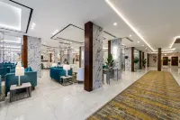 Garden Millennium Hotel -Alsewes/Jazan Отели в г. 