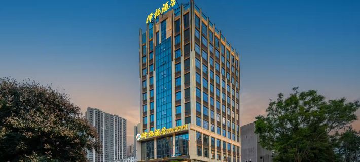 ZE QI HOTEL Hotele w: Xingyi