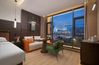 Xingyi Jushan Square Dongpoying Hotel (Menglecheng) - Hot Springs