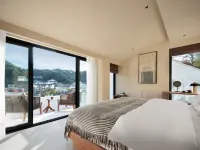 Jiuhuashan Xiangzili Homestay (Meat Body Palace Branch) فنادق في تشينغيانغ