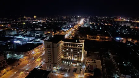 HUA QIAO Hotel Отели рядом с достопримечательностью «Haishi Park»