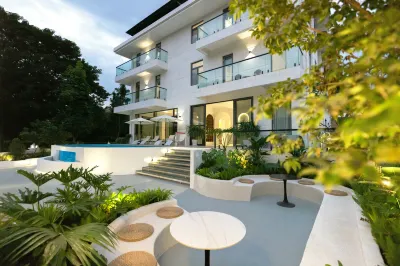 Xishuangbanna Qixuju Yishu Resort Hotel Hotels in Poshui Plaza