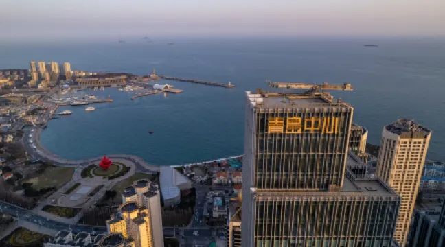 Melody Seaview Hotel Apartment (Qingdao Wusi Square Mixc City) Отели в г. Циндао