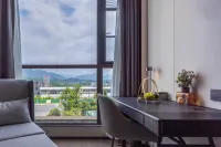 โรงแรมเอทัวร์ สถานีรถไฟ เอ๋อเหม่ยซาน ทะเลสาบเอ็กซิ่ว - วิวภูเขา