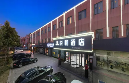 Yuehe Hotel Zaozhuang Отели рядом с достопримечательностью «Guanshi Durian Garden Tourist Resort»