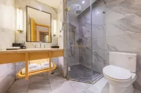 Jiuzhou Fangyuan Hotel(Yichang Wanda Binjiang Store) - خدمة نقل من وإلى المطار