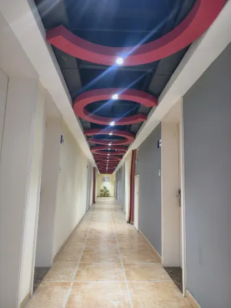 Home Pebble Hotel (Yangzhong Pedestrian Street Jiangzhou East Road)