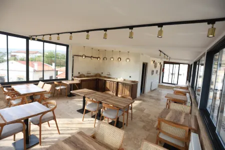 Erdu Cappadocia Stone House Hotel Отели в г. Аванос