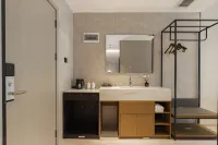 Lohas Hotel (Shangrao Wannian Caifu Pedestrian Street Runfeng Shopping Plaza) Hotel dekat Wannian Railway Station