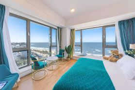 Qitong Scenic Apartment (Weihai International Coastal Baths Huoju 8th Street)