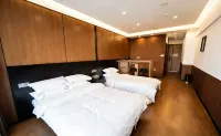 Meilun Meijia Hotel (Shenyang Longzhimeng Shopping Center Pangjiang Street Subway Station)
