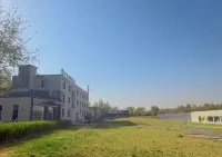 Floral Hotel·Sculptor’s Hotel (Hohhot Wanda Plaza) - con vista montagne