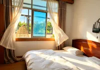 Jinheju Simple Vacation Apartment (Dai Ethnic Ancient Town Mangshi Square) - 2-Star