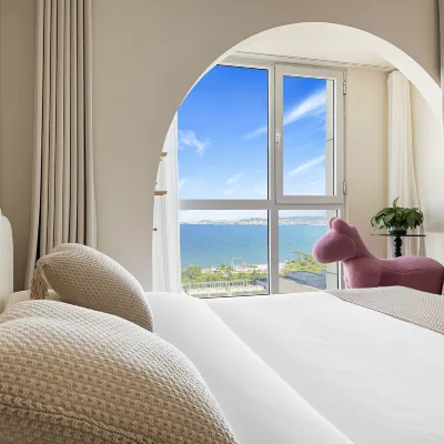 OUYU.SEAFRONT｜Sea View｜Projector｜Designer Stay (Weihai Park 'Frame' Branch) โรงแรมใกล้เดอะซุยดาบ