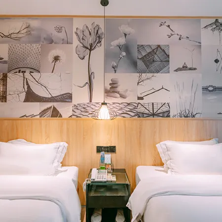 Qingmu Chain Hotel (Ma'an Shandong Railway Station Hongxing Meikailong RT-Mart)