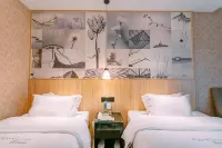 Qingmu Chain Hotel (Ma'an Shandong Railway Station Hongxing Meikailong RT-Mart)