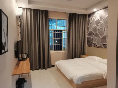 Mayang Rainbow Bridge Business Hotel Отели рядом с достопримечательностью «Teng Daiyuan Memorial Hall»