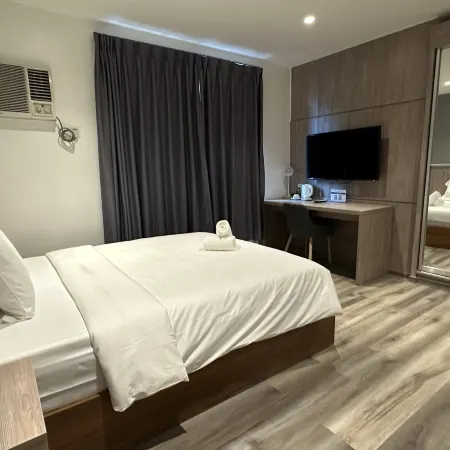 Mc Hotel Fairview Отели рядом с достопримечательностью «СМ City Fairview»