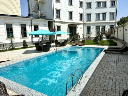 Garnet hotel Отели рядом с достопримечательностью «Рынок Чорсу»