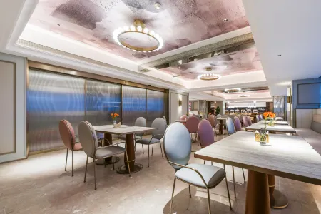 Mercure Wuxi East Railway Station Отели в г. Уси