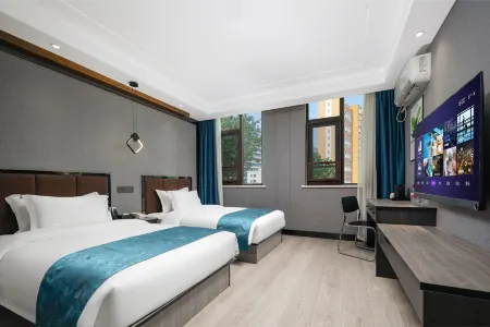 Nanyang Wolong Impression Hotel (Wolong Normal University) Отели рядом с достопримечательностью «Nanyang Normal University»