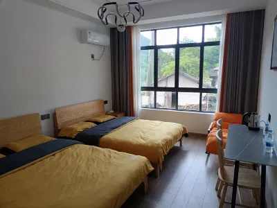 Jiani Shangu Homestay Отели рядом с достопримечательностью «Волна Большого Резака»