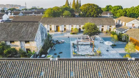 Lan Duo San Wu Dou Homestay Отели рядом с достопримечательностью «Wansheng Rice Merchants»