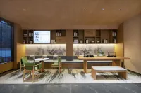 QIANNA HOTEL GLORIOUS (Xinyang Railway Station Shihe District)