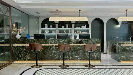 Vishan Garden Boutique Hotel Отели рядом с достопримечательностью «Shuzhuang Garden»