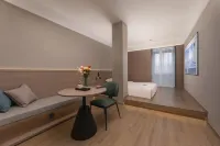 Miofon Hotel (East Bus Station And The City Light Branch）