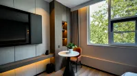 GRACEFUL CHARM HOTEL Отели рядом с достопримечательностью «Tangtou Passenger Transport Terminal»