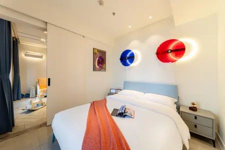 Yueyi Holiday Homestay (Anaya Hall) Отели рядом с достопримечательностью «Aranya Library»