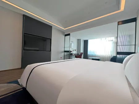 Hehot International Convention and Exhibition Center Fengdu Hotel Отели рядом с достопримечательностью «Inner Mongolia Technical College of Mechanics & Electrics»