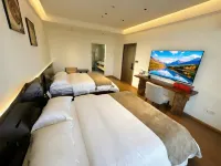 Xingyi Riverside Time Homestay (Wanfenglin Scenic Area) - 마운틴 뷰