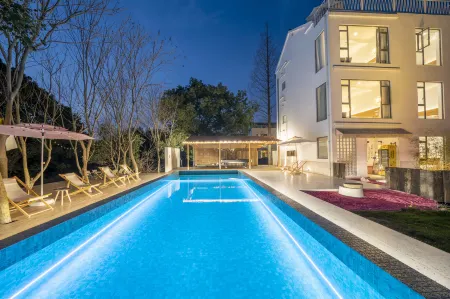 Daochi Garden Hotel Отели рядом с достопримечательностью «Shanghai Wild Animal Park»