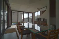 Araya Beach Casas Hotels in Lian