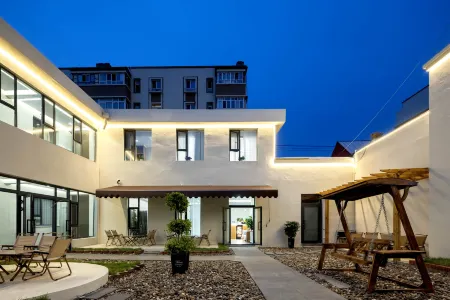 Sixiang Stars Homestay Отели рядом с достопримечательностью «Gulja Gymnasium»