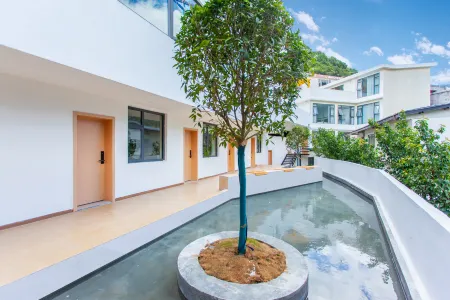 Kangding Zhuyu Bieyuan Homestay Отели в г. Кандин