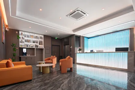 Yechao Hotel (Wanning High-Speed Rail East Station Huaya Huanlecheng) Отели рядом со станцией Wanning Railway Station