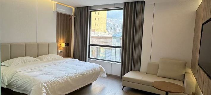Yuanmu Homestay Hotel (Longnan Station Longnan First People's Hospital) 룽난 호텔